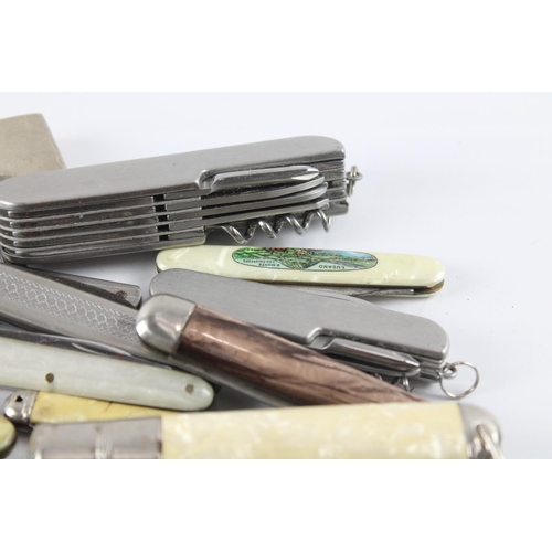 2286 - A collection of vintage pocket knives