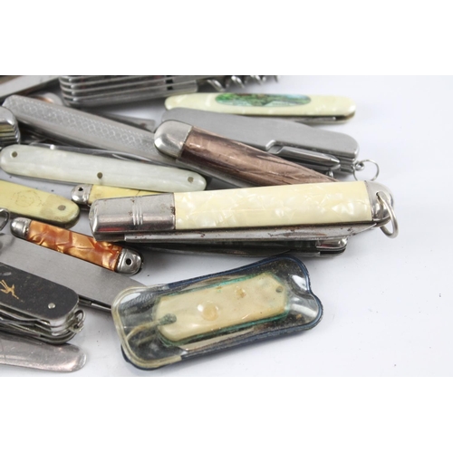 2286 - A collection of vintage pocket knives