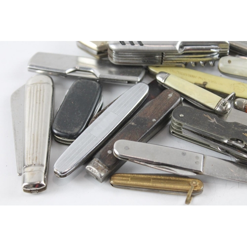 2286 - A collection of vintage pocket knives