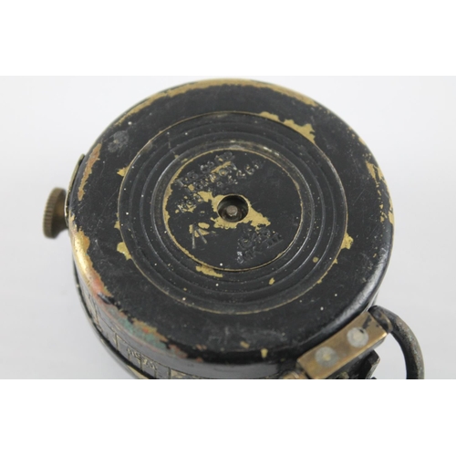 2374 - A T.G. & Co WWII British fluid filled military compass, dated 1943