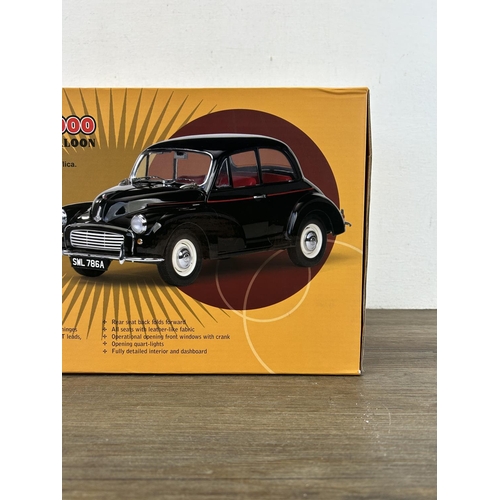 1345 - A boxed Sun Star 1965 Morris Minor 1000 1:12 scale diecast model replica