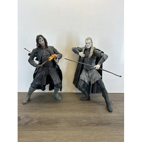 1347 - A collection of toys and figurines to include NLP Inc. legolas, NLP inc. Aragorn etc.