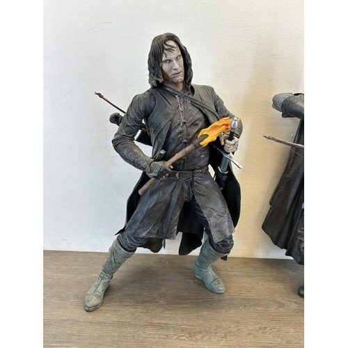 1347 - A collection of toys and figurines to include NLP Inc. legolas, NLP inc. Aragorn etc.