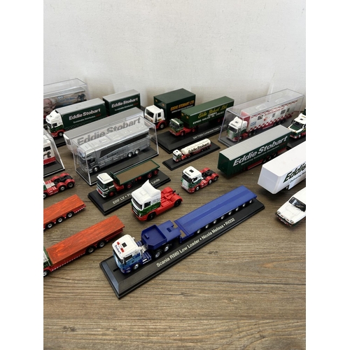 1350 - A collection of Eddie Stobart diecast model vehicles to include Corgi Mini, Corgi Ford Focus WRC, 6 ... 