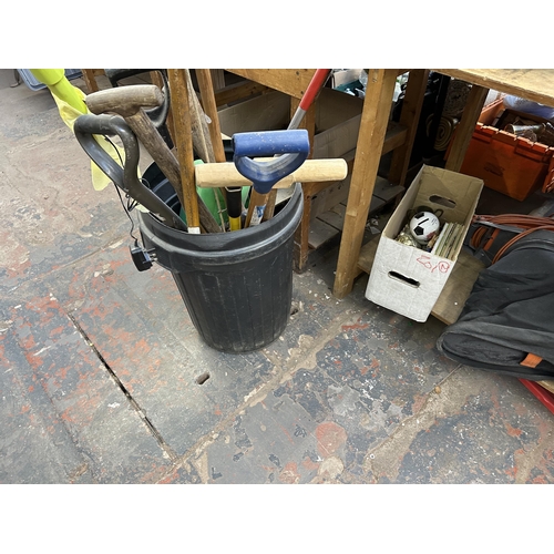 1603 - A collection of house clearance items to include Bosch Rotak 320, metalware, sports equipment, frame... 