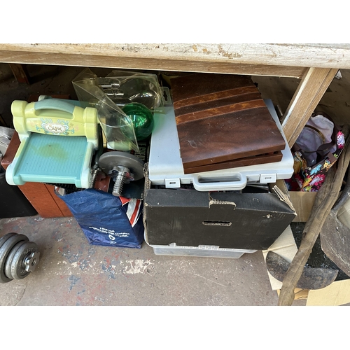 1605A - A collection of house clearance items to include The Beauty Works Lean Machine, CDs, dumbbells etc.