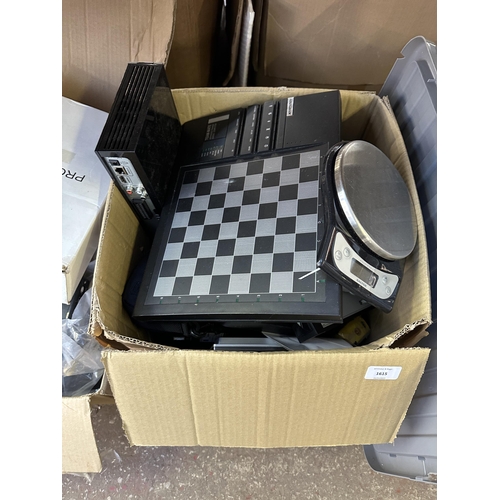 1615 - Four boxes containing Salter scales, Bluetooth headphones, Kasparov digital chess board etc.