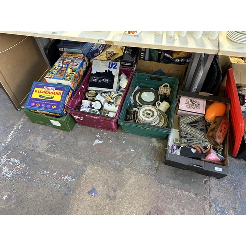 1636 - Four boxes containing ceramics, character jugs, boxed games etc.