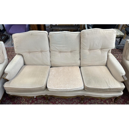 1161 - A French Louis XV style carved beech and fabric upholstered three piece lounge suite comprising thre... 