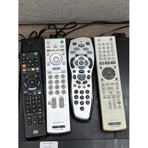 1517A - Three items, one Sony RDR-GX120 DVD recorder with remote control, one Logik VR960A VHS/VCR and one S... 