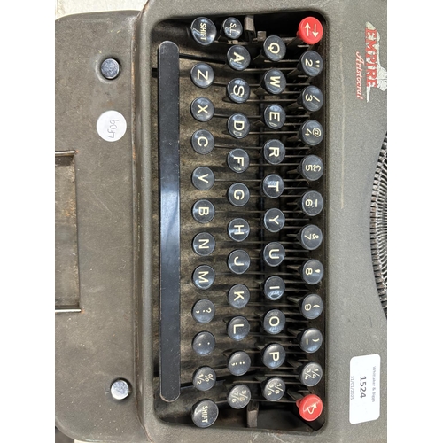 1524 - Two cased portable typewriters, one Empire Aristocrat and one Olivetti Dora