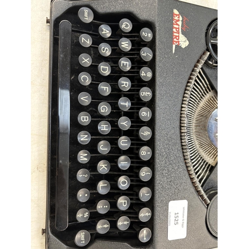 1525 - A cased Empire Baby portable typewriter