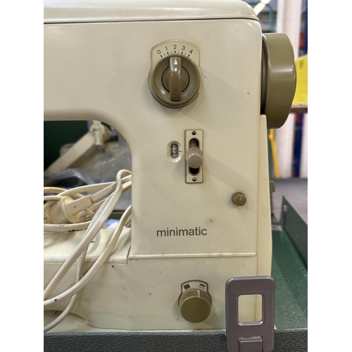 1527 - A cased Bernina Minimatic electric sewing machine with attachments, accessories, power cable, foot p... 