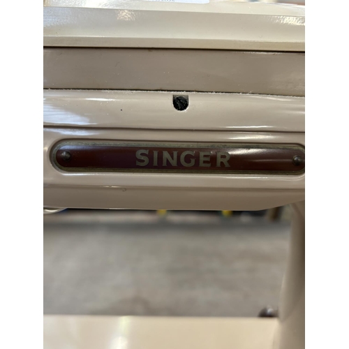 1528 - A Singer 404G13 electric sewing machine