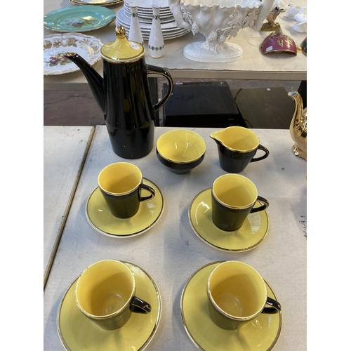 1280 - A mid 20th century Palissy Madeleine 22ct gold decorated fifteen piece coffee set