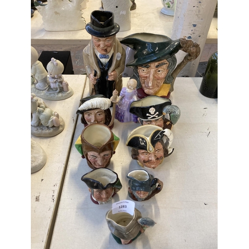 1283 - Ten pieces of Royal Doulton ceramics, one Rose HN2123 figurine and nine character jugs to include Pi... 