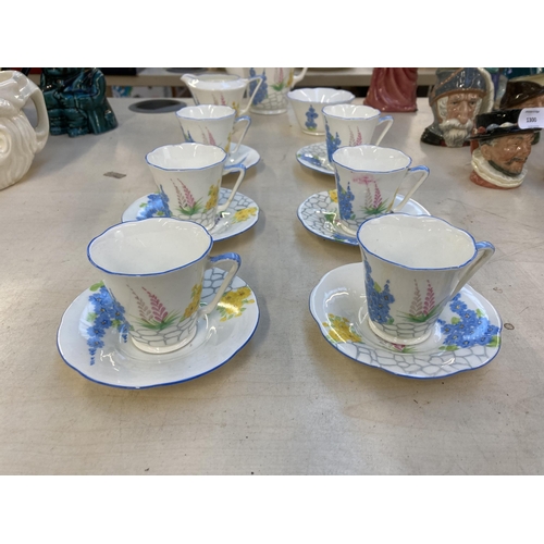 1299 - An Art Deco Grafton China 5807 hand painted fifteen piece coffee set