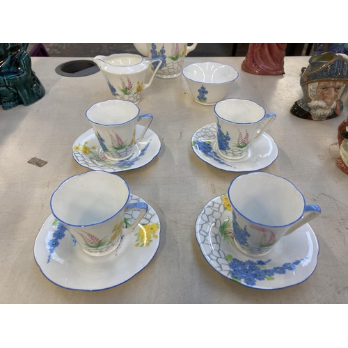 1299 - An Art Deco Grafton China 5807 hand painted fifteen piece coffee set