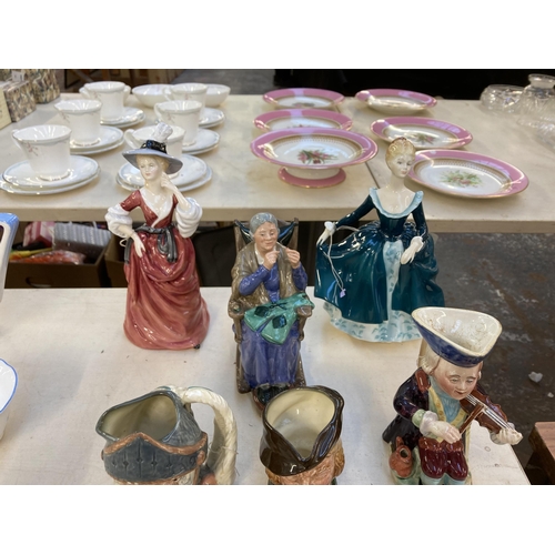 1300 - Nine pieces of ceramics to include Royal Doulton A Stitch in Time figurine - HN2352, Royal Doulton J... 