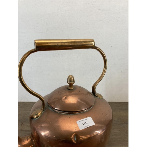 1312 - A Victorian copper kettle with acorn finial - approx. 34cm high