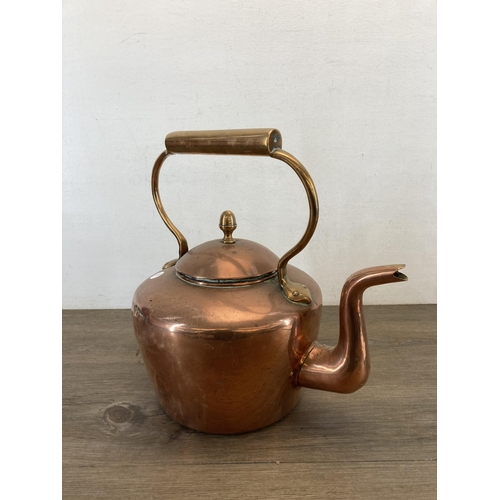 1312 - A Victorian copper kettle with acorn finial - approx. 34cm high