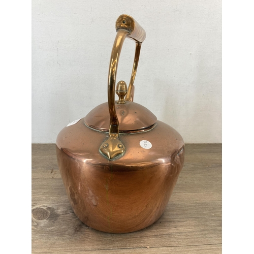 1312 - A Victorian copper kettle with acorn finial - approx. 34cm high