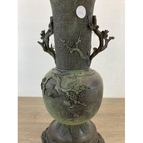 1314 - A Japanese Meiji period bronze twin handled vase with bird and foliate decoration - approx. 41cm hig... 