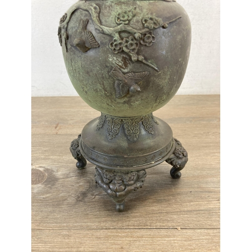 1314 - A Japanese Meiji period bronze twin handled vase with bird and foliate decoration - approx. 41cm hig... 