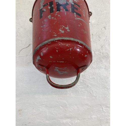 1320 - Two vintage painted galvanised fire buckets - approx. 34cm high