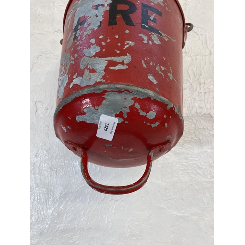 1320 - Two vintage painted galvanised fire buckets - approx. 34cm high