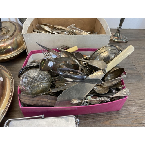 1324 - A collection of silver plated ware to include cutlery, tureens, circular footed dish etc.