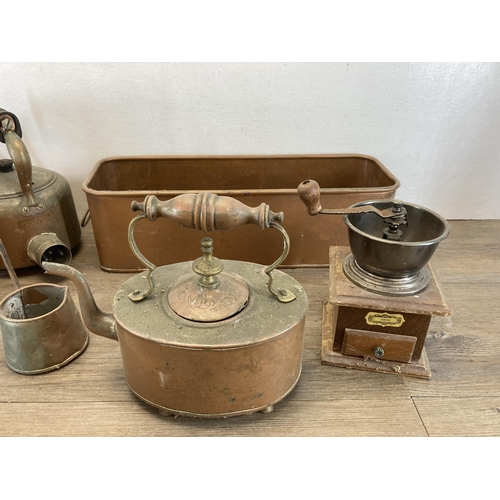 1327 - A collection of metalware to include copper planter, Victorian copper kettle etc.