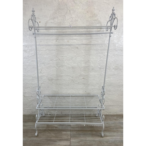 1115 - A white painted wrought metal coat stand - approx. 186cm high x 106cm wide x 55cm deep