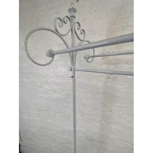 1115 - A white painted wrought metal coat stand - approx. 186cm high x 106cm wide x 55cm deep