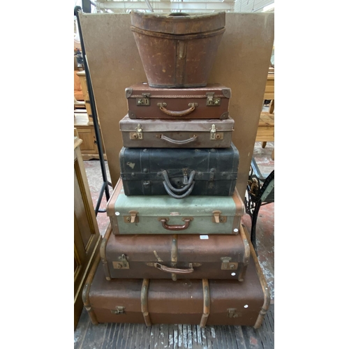 1116 - Seven early 20th century storage items, one leather hat box and six travel trunks - largest approx. ... 