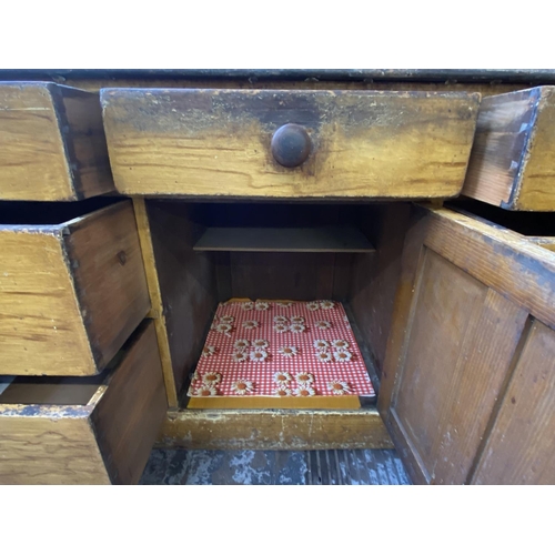 1118 - A Victorian scumbled pine sideboard - approx. 105cm high x 184cm wide x 64cm deep