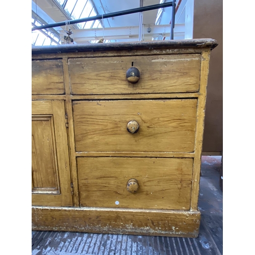 1118 - A Victorian scumbled pine sideboard - approx. 105cm high x 184cm wide x 64cm deep