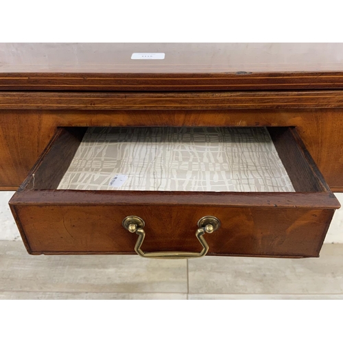 1119 - A George III inlaid mahogany fold over tea table - approx. 74cm high x 89cm wide x 45cm deep not ext... 