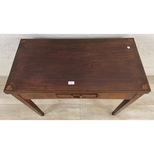 1119 - A George III inlaid mahogany fold over tea table - approx. 74cm high x 89cm wide x 45cm deep not ext... 