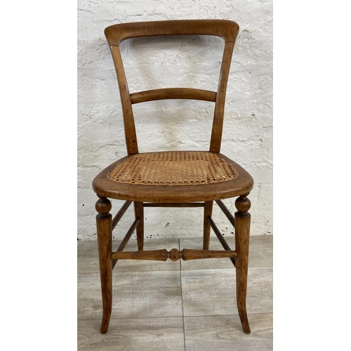 1122 - A pair of late Victorian/Edwardian beech and cane seated occasional chairs - approx. 82cm high x 40c... 