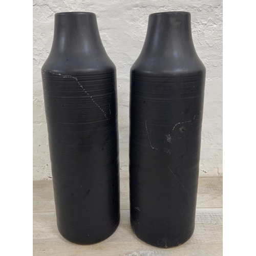 1124 - A pair of Dunelm black ceramic 58cm vases