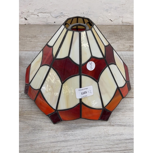 1125 - A pair of Tiffany style stained glass lampshades - approx. 31cm diameter