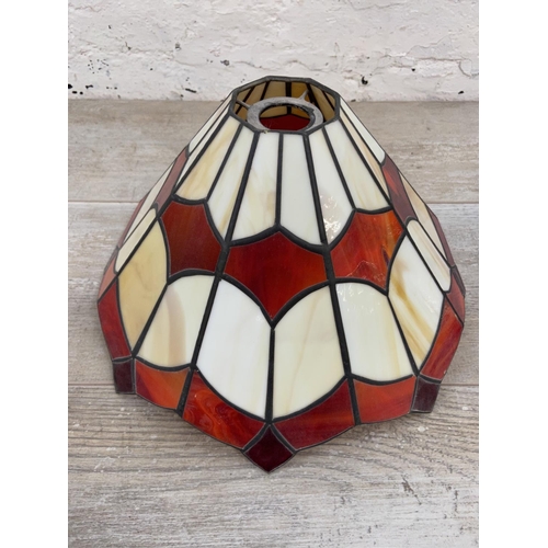 1125 - A pair of Tiffany style stained glass lampshades - approx. 31cm diameter