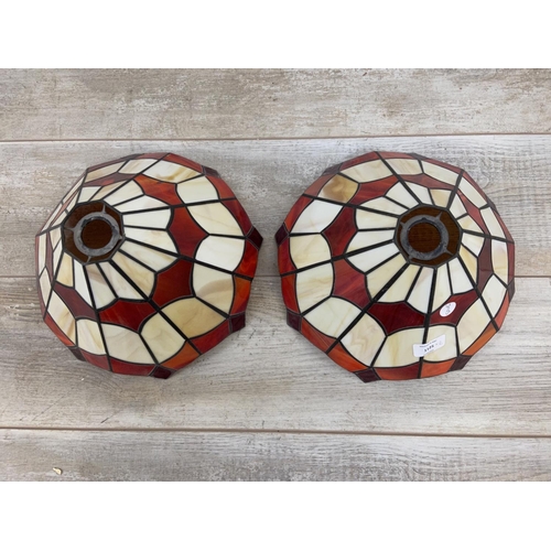 1125 - A pair of Tiffany style stained glass lampshades - approx. 31cm diameter