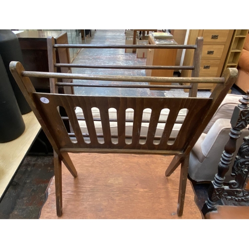 1128 - Three pieces of furniture, one Edwardian oak serpentine two tier side table, one cherrywood side tab... 