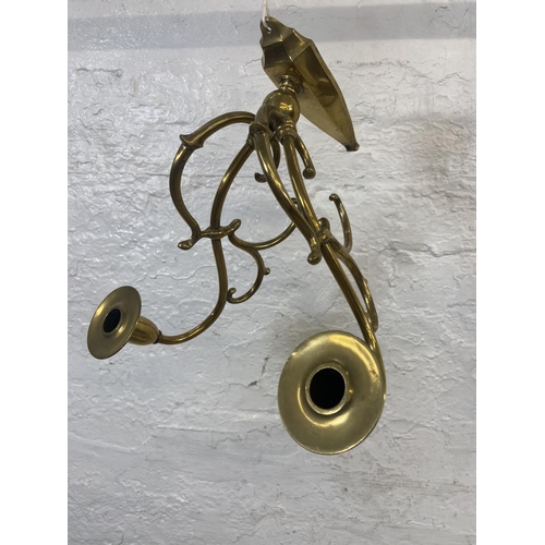 1132 - An early 20th century brass twin branch rise and fall ceiling light with opaline glass shades togeth... 