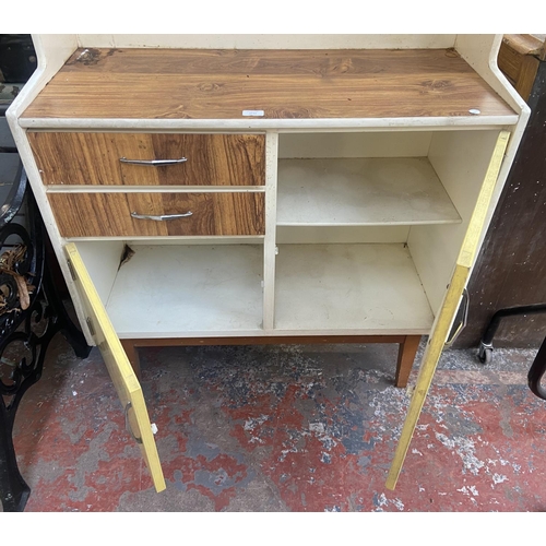 1133 - A mid 20th century Fortress yellow and white painted and teak effect kitchen cabinet - approx. 149cm... 