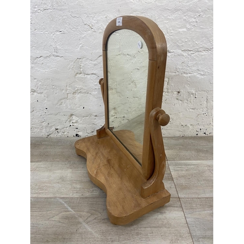 1139 - Two late 19th/early 20th century swing dressing table/toilet mirrors, one satinwood and one mahogany... 