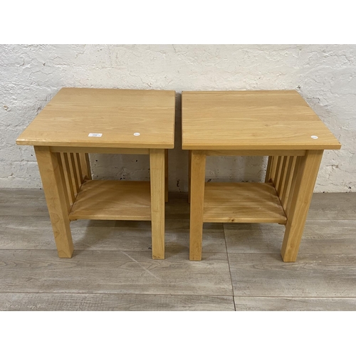 1142 - A pair of modern beech side tables - approx. 51cm high x 45cm wide x 45cm deep