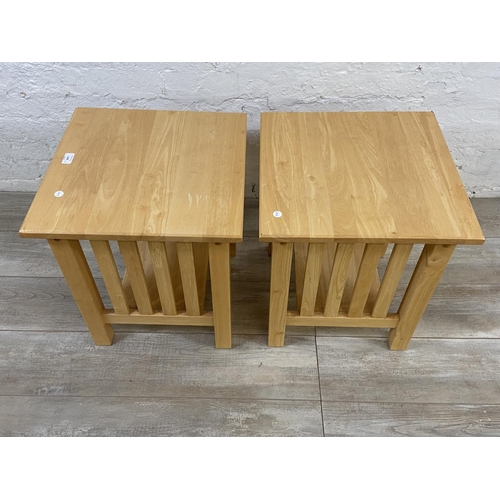 1142 - A pair of modern beech side tables - approx. 51cm high x 45cm wide x 45cm deep